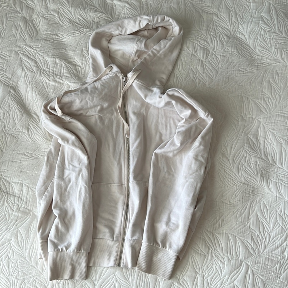 white zip up jacket